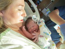 Elli Holds Evelyn Pope for the First Time